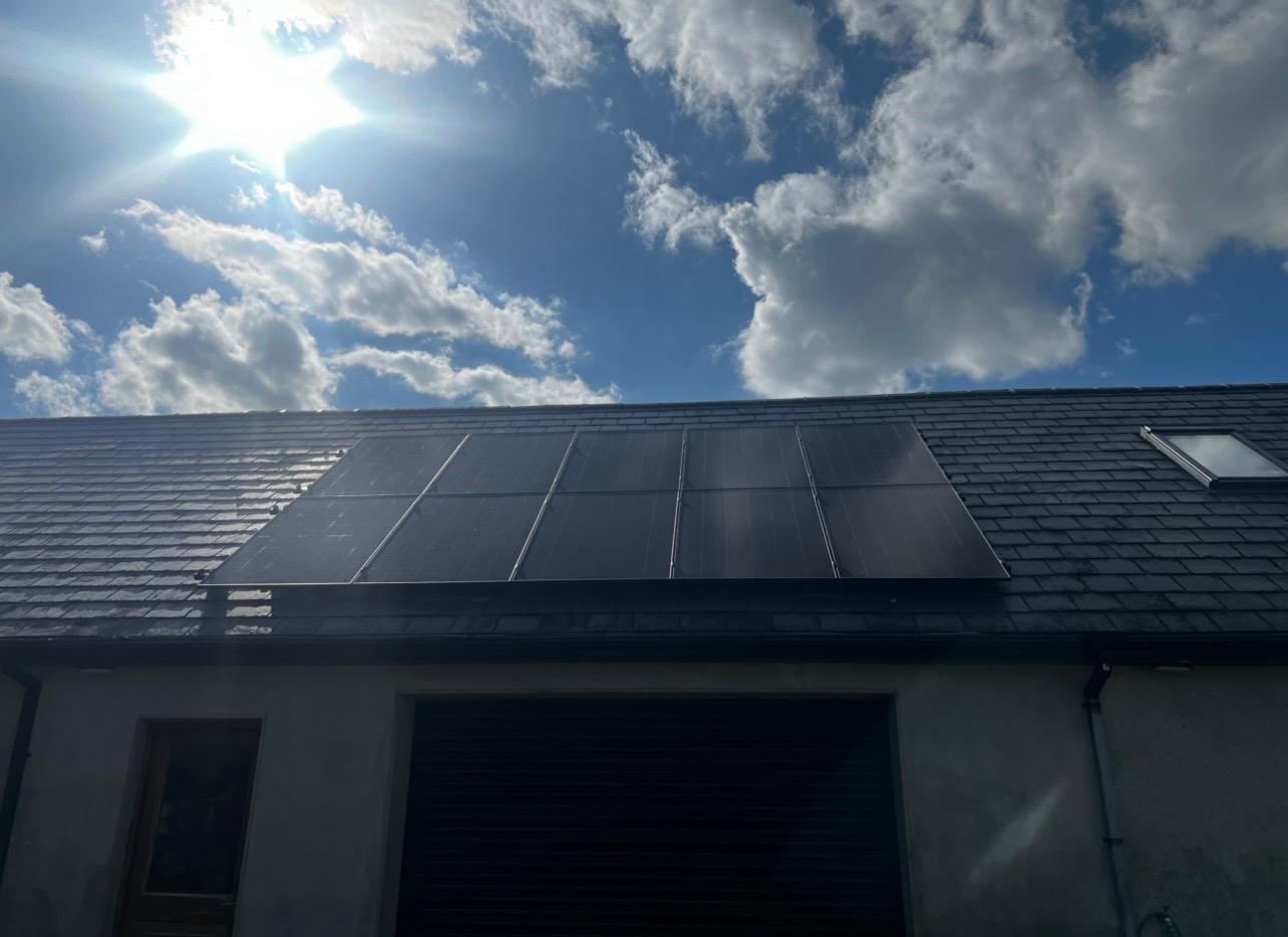 Irish home with solar panels for residential energy savings
